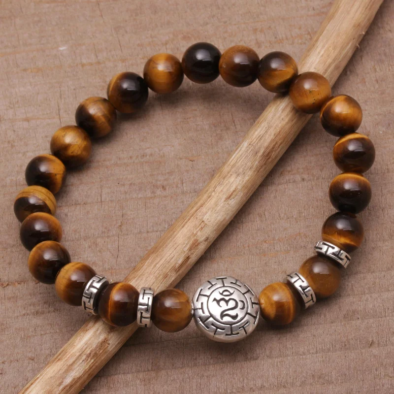 multi-layer gold bracelet -Temesir Om Tiger's Eye Beaded Om Stretch Bracelet from Bali