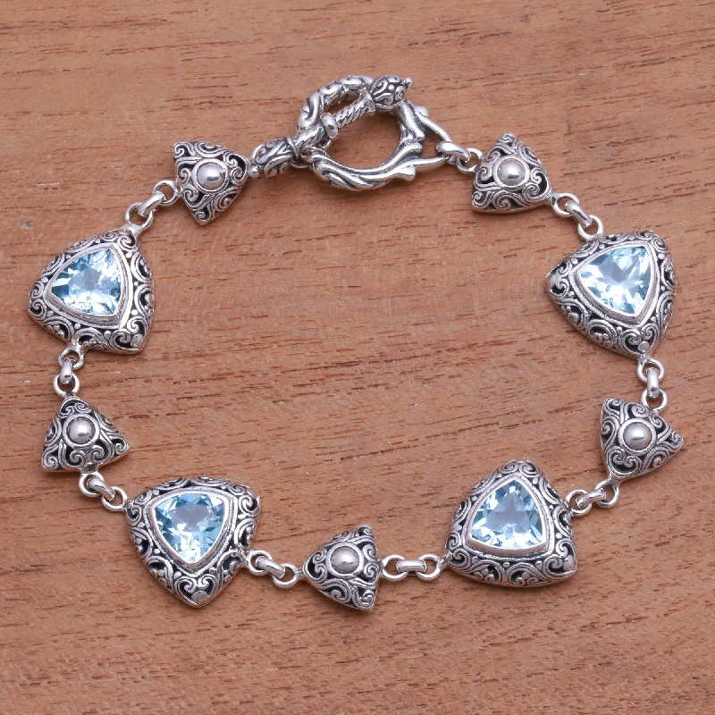 sterling silver bracelet with charm -Triangles of Swirls Triangular Blue Topaz Link Bracelet from Bali