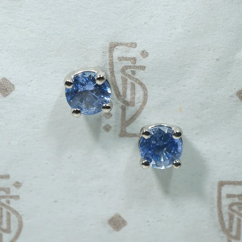 Fashionable silver stud earrings for versatile style -Baby Blues .84tcw Sapphire Stud Earrings in Platinum