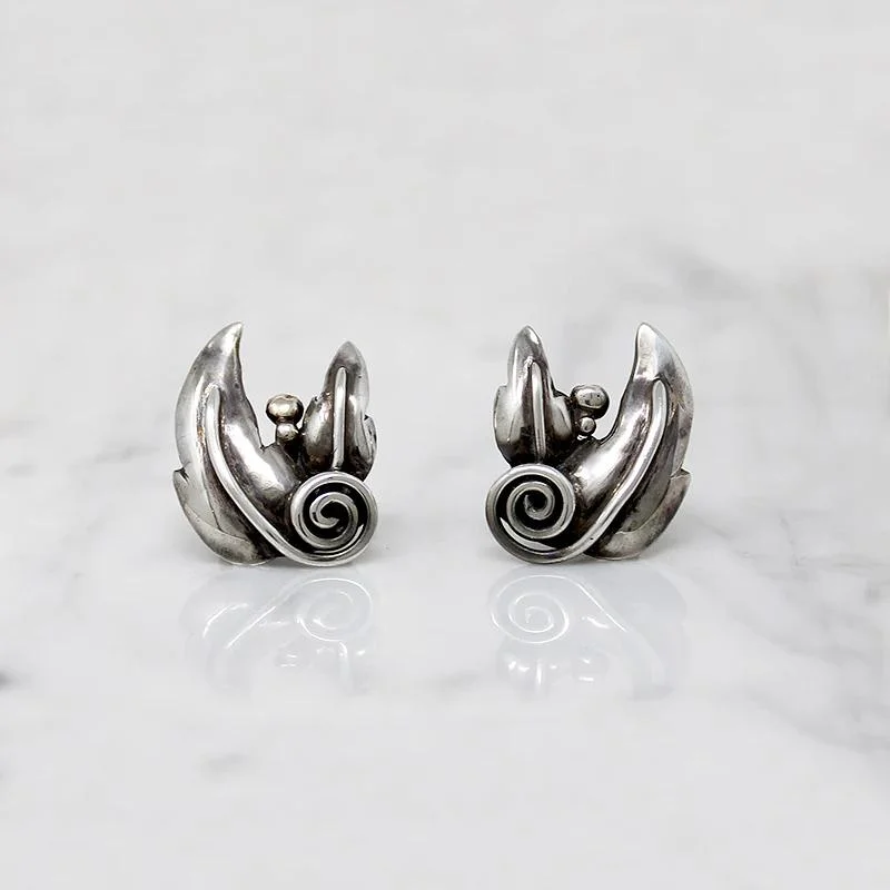 Statement ear cuffs for bold fashion -Ella Cone Modernist Sterling Leaf Earrings