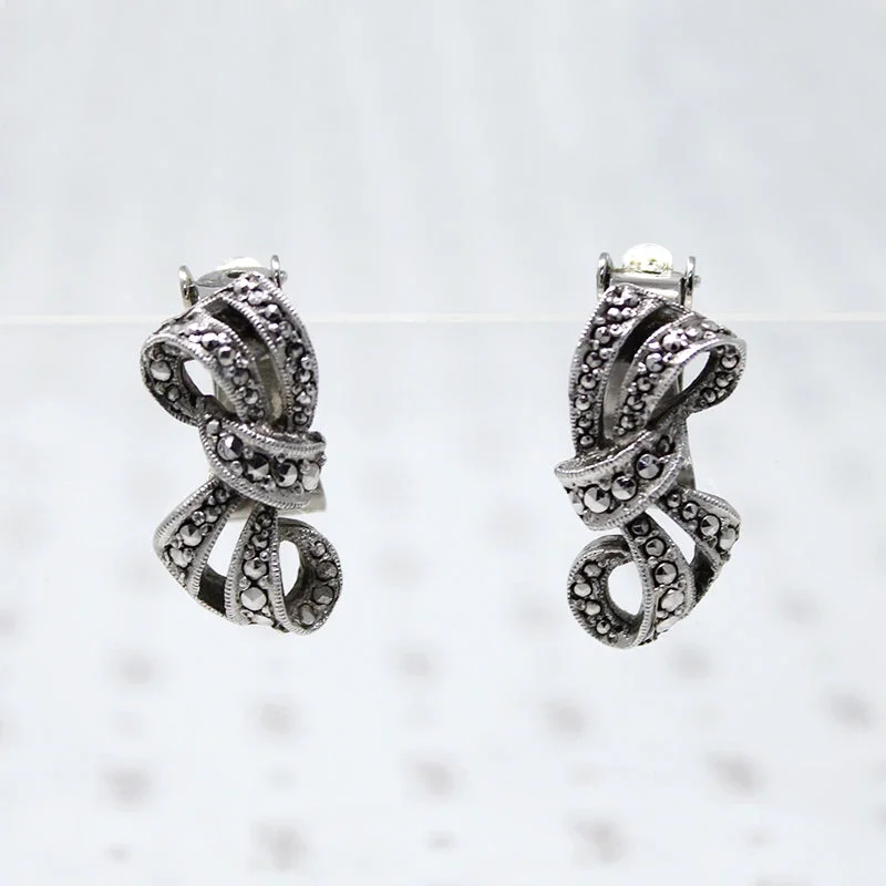 Silver and pearl earrings for elegant touch -English Marcasite Bow Clip On Earrings